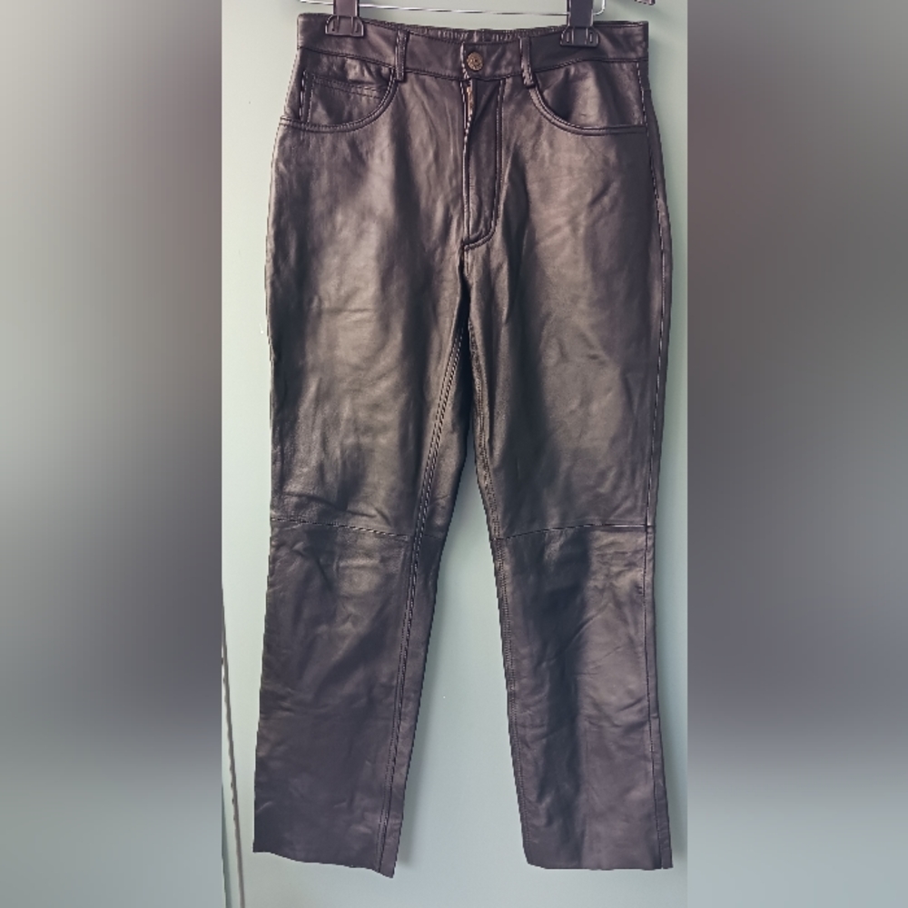 Black leather lining pants with front and back pockets, straight leg, size 4.